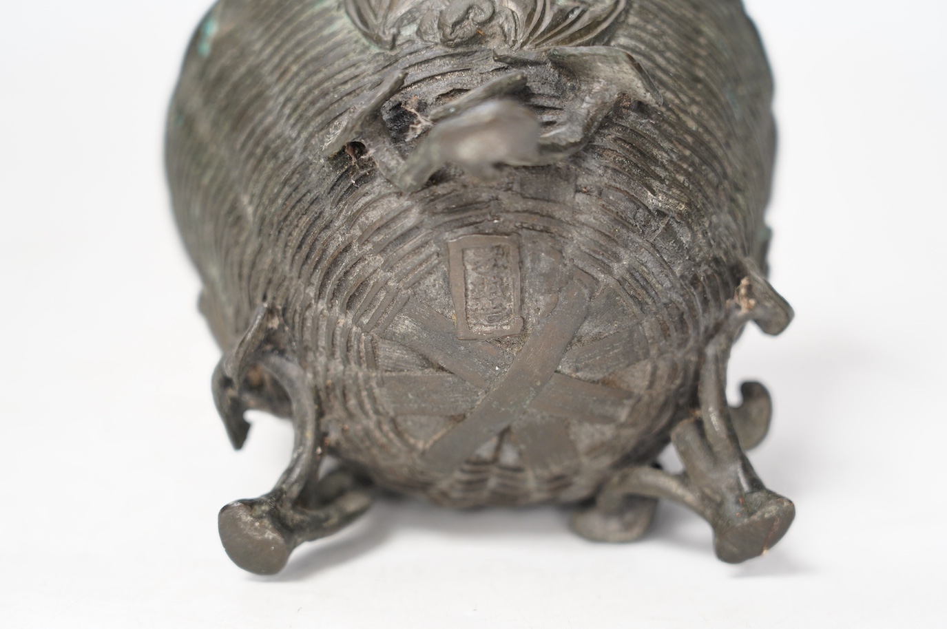 A Japanese bronze tripod censer cast with bats, three character maker’s mark, 12cm in diameter. Condition - fair to good